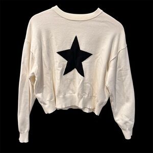 Orange Kiss Essentials white cropped sweater w/ a black star graphic Size Small